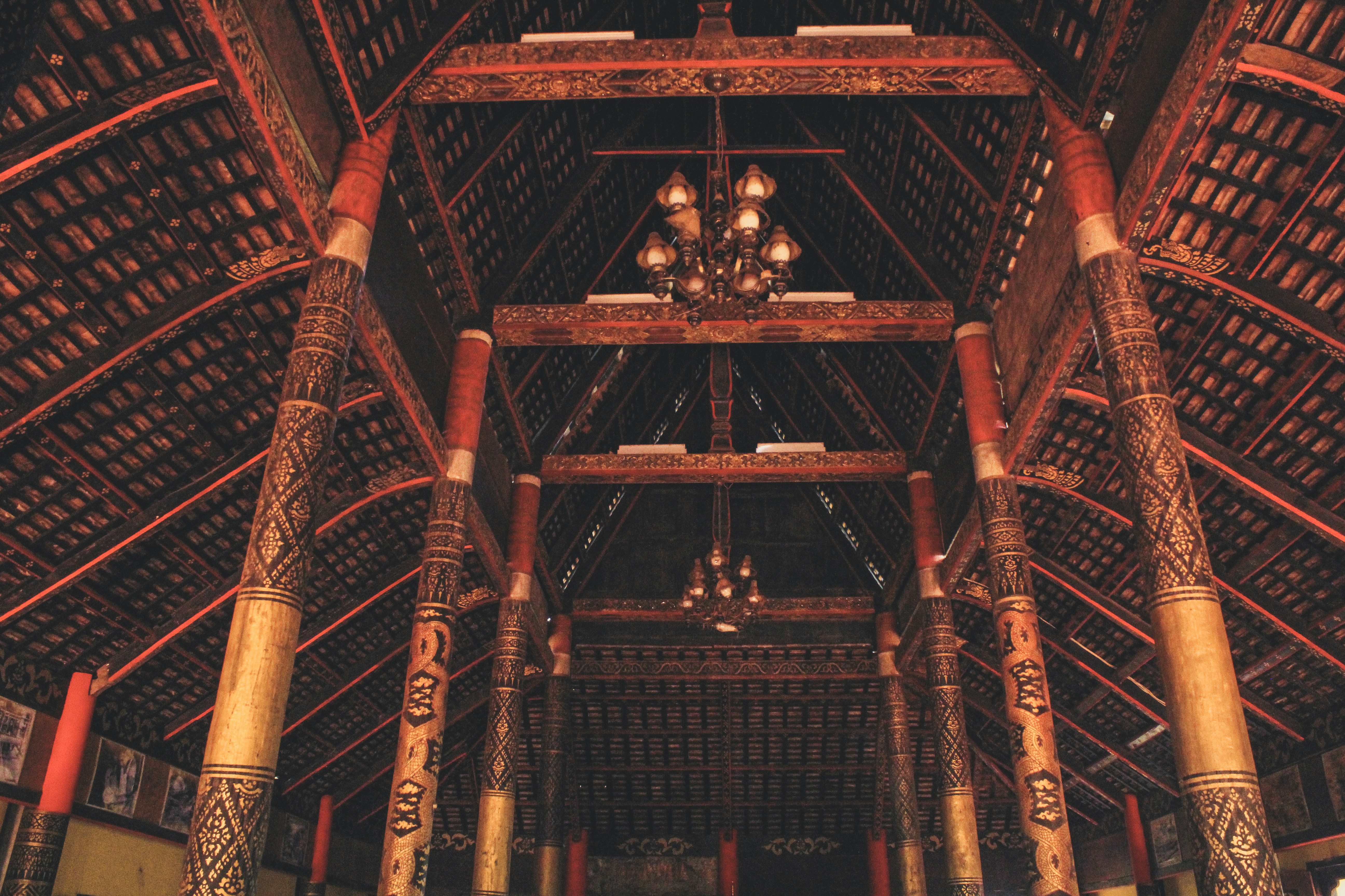 The inside of a building with a ceiling made of wood
